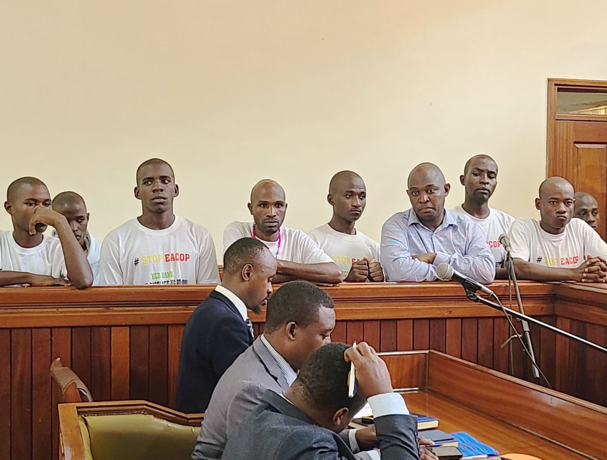 Photo of 11 climate activists in courtroom in Uganda