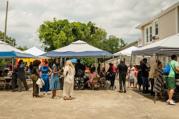 Pictured: Rooted and Rising attendees assemble disaster relief kits in New Orleans.