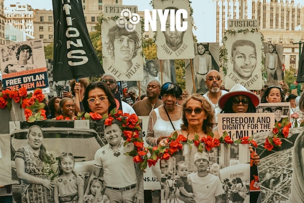 Protesters hold up photos of kidnapped immigrants in NYC